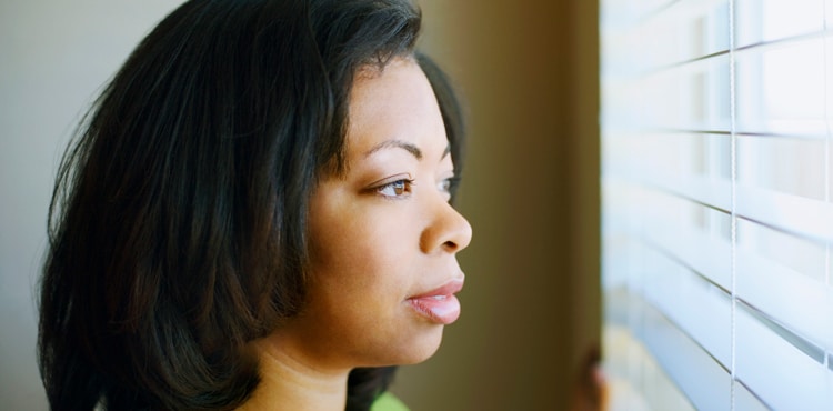 Woman Looking Out Window - Massachusetts Talcum Powder Cancer Lawsuit