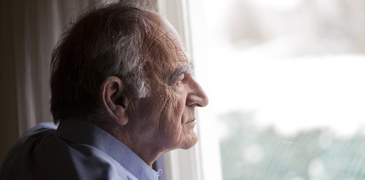 Old Man Looking Out Window - Massachusetts Xarelto Lawsuit