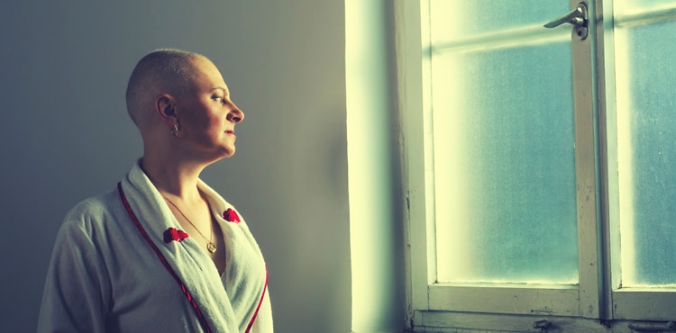 Woman Looking Out Window - Massachusetts Taxotere Hair Loss Lawsuit