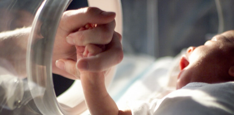 Newborn Holding Hand - Minnesota Clomid Lawsuit