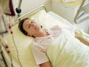 Woman in Hospital Bed | Missouri Xarelto Lawsuit