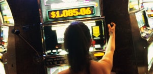 Woman Playing Slots | North Carolina Abilify Lawsuit