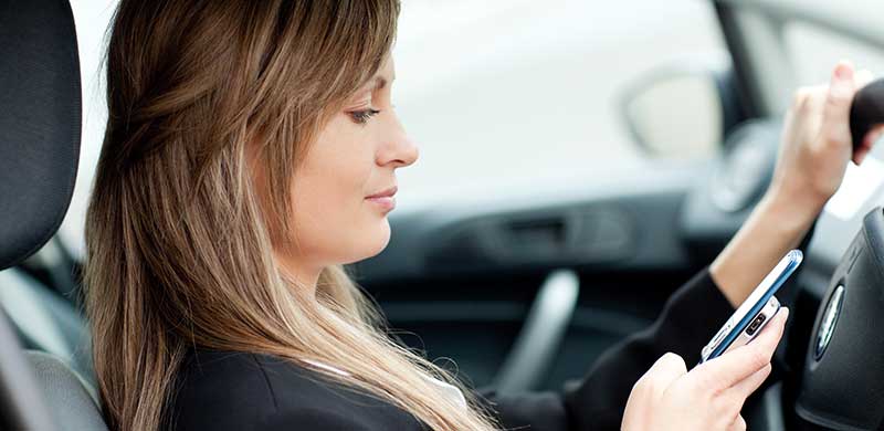 Woman texting and Driving | Pennsylvania Car Accident Lawyer