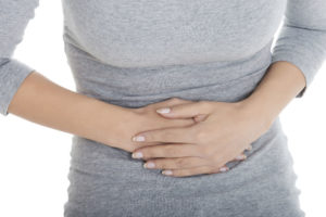 Woman holding her stomach | Washington Benicar Lawsuit