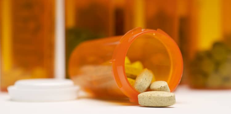 Pills out of bottle | Actos Lawsuit Attorneys