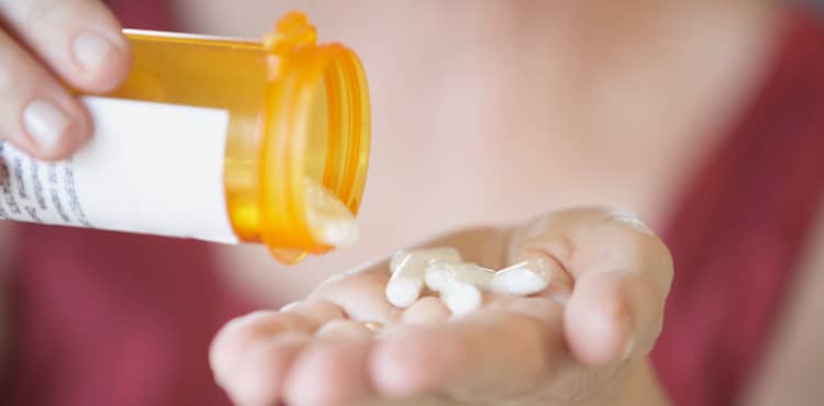 Pills in hand | Stevens Johnson Syndrome Lawsuit