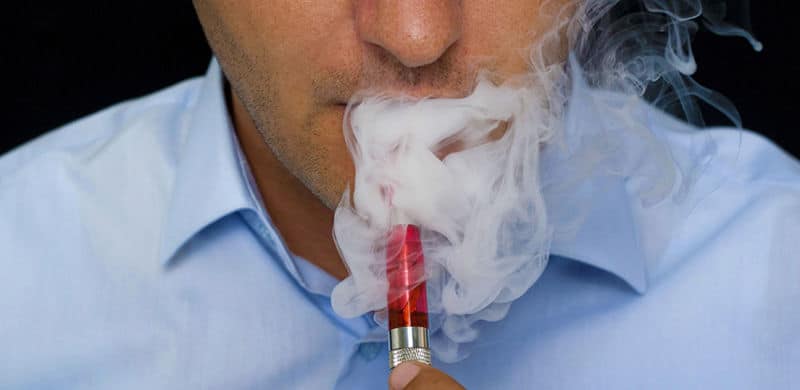 Man Smoking An E-Cig | E-Cigarette Attorney
