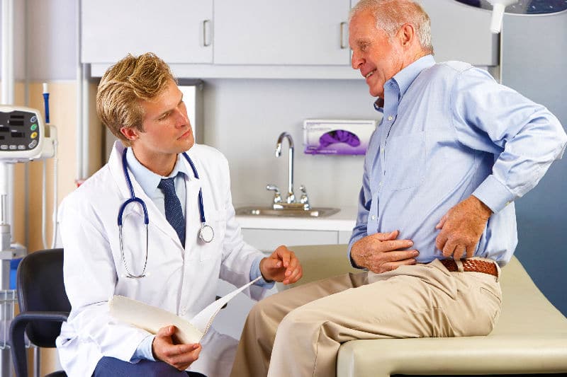 Man Holding His Hip | DePuy Hip Implant Attorney