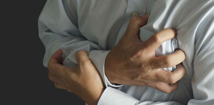 Clutching Chest | Kombiglyze Lawsuit: Kombiglyze Heart Attack Attorney Help