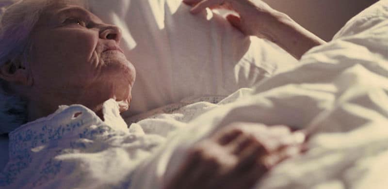 Elderly Woman In Bed | Saber Healthcare Lawsuit