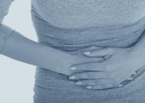 Woman Holding Stomach | Viberzi Lawsuit
