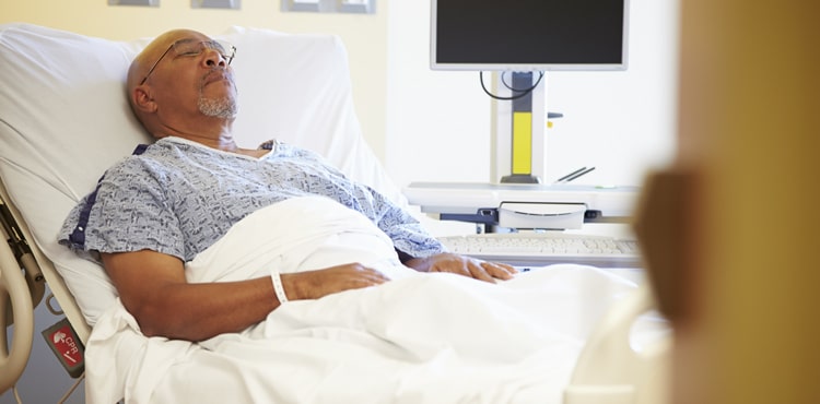 Man in Hospital Bed | Kugel Hernia Mesh Lawsuit
