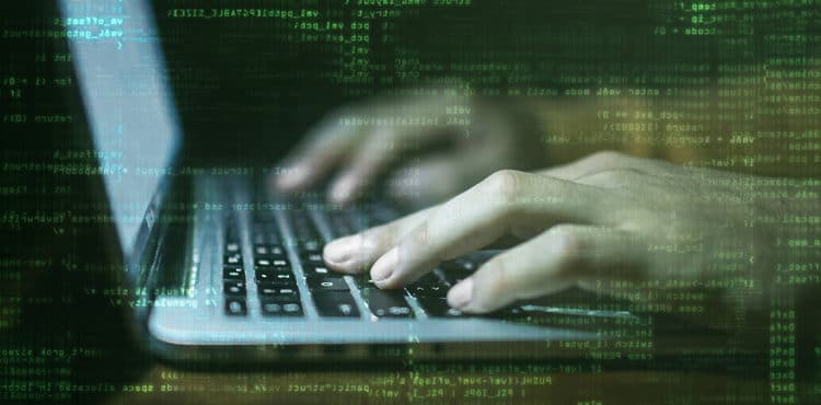 Typing on Computer Keyboard - OneLogin Data Breach