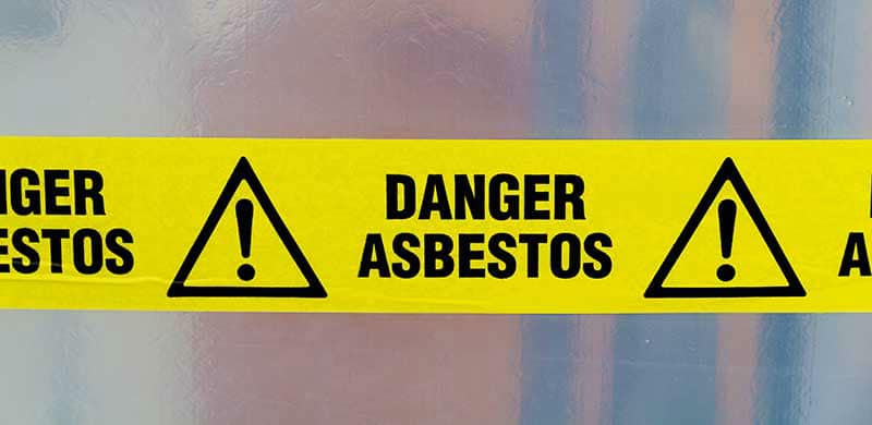 Danger Asbestos Yellow Tape | Oklahoma Product Liability Lawyer