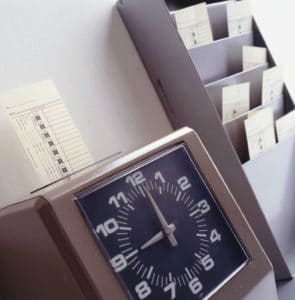 Clocking in machine | Texas Unpaid Overtime Lawsuit