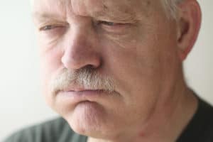 Man Experiencing Discomfort from Heartburn | Iowa Nexium Lawsuit